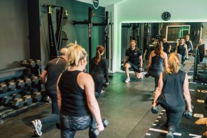 Group Personal Training Session with dumbbells